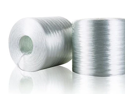 What equipment is used in the production of fiberglass yarn?
